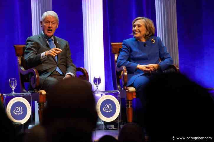 Bill Clinton is hospitalized with a fever but in good spirits, spokesperson says