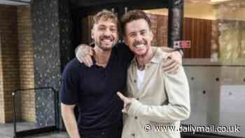 I'm A Celeb winner Danny Jones poses with former King of the Jungle Sam Thompson as they enjoy a surprise meeting at This Morning studios