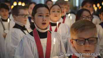 Girls to sing at St Paul's Cathedral's Christmas Day service for the first time ever: Young choristers snapped preparing for their big day