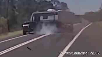 Terrifying moment drivers narrowly avoid death as ute towing a caravan exposes dangerous fault hiding in plain sight