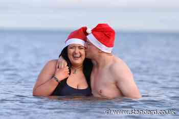 Couple who met at Helen’s Bay charity swim return for another festive dip