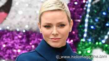 Princess Charlene unveils sky-high fiery Christmas tree inside palace home