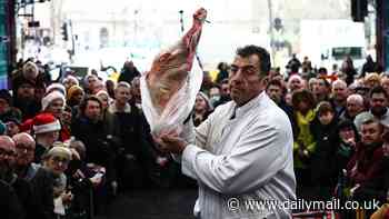 World's oldest meat market Smithfield holds Christmas Eve meat auction after announcing it will close