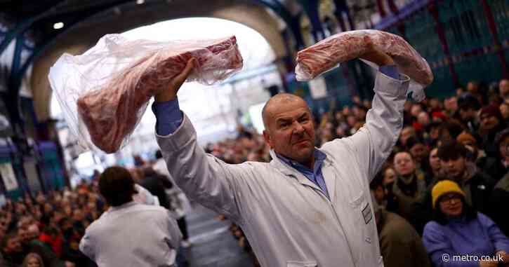 Britain’s oldest meat market holds Christmas Eve auction ahead of potential closure after 800 years