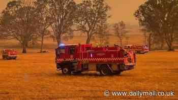 Firefighters battle to contain inferno but warn the blaze could rage out of control for WEEKS as temperatures soar