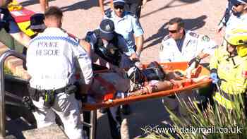 Dramatic scenes at Bronte beach as partygoer is rescued after falling while jumping from a cliff into an ocean pool