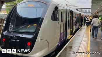 Person caught in train doors pulled along platform