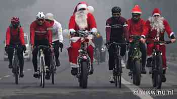 In beeld | Kerkdiensten, strand en diners: zo vieren we wereldwijd Kerst