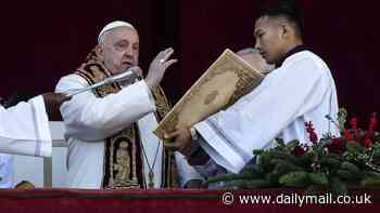 Pope Francis calls on the world 'to silence sounds of arms and overcome divisions' in his Christmas message