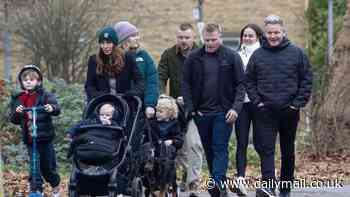 Gordon Ramsay looks every inch the doting father as he wraps up warm for a Christmas Day walk with all of the family