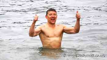 Ben Shephard, 50, shows off his impressively chiselled abs as he strips off to brave the cold for Christmas Day dip in Cornwall