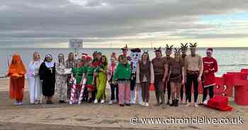 Christmas Day dippers brave the North Sea off the Northumberland coast