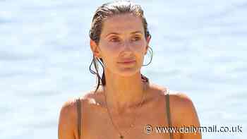 Kate Waterhouse flaunts her enviable bikini body as she enjoys an early Christmas morning swim with husband Luke Ricketson