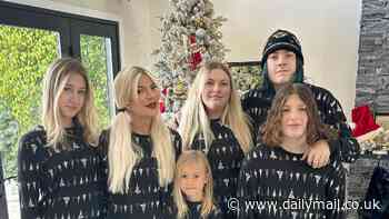 Tori Spelling dons matching PJs with all five of her kids on Christmas as mother Candy gifts them caviar