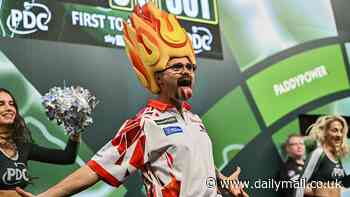 Aussie darts star Damon Heta hits a NINE-DARTER, the sport's pinnacle, triggering a £60k pay-out to a random fan in the crowd at Ally Pally