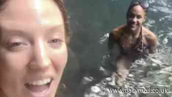 Bikini-clad Jess Glynne and Alex Scott enjoy a waterfall plunge after jetting off for a romantic festive getaway