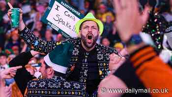 Darts fan who won £60,000 after Damon Heta's World Championship nine-darter reveals how he'll spend the money