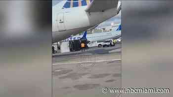 United plane hits, flips box truck on Miami International Airport tarmac