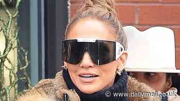 Jennifer Lopez bundles up in a puffer coat on winter shopping spree with Emme, 16, in Aspen