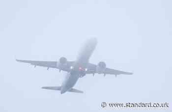 Dozens of flights cancelled and hundreds delayed at London airports as thick fog sparks travel chaos