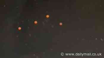 Bright orange 'UFO orbs' appearing over NYC have everyone asking the same question