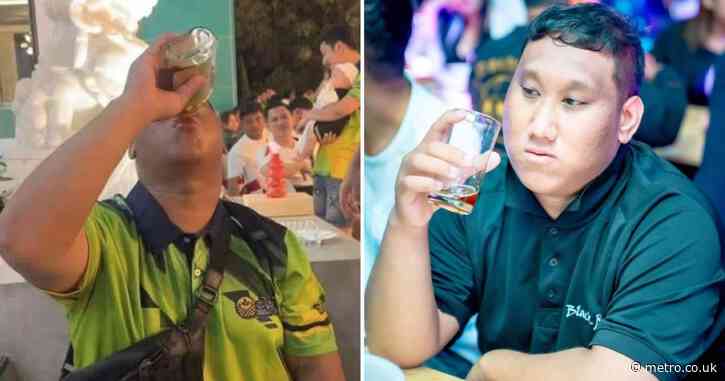 Street seller dies in paid dare to chug entire bottle of whiskey for £700