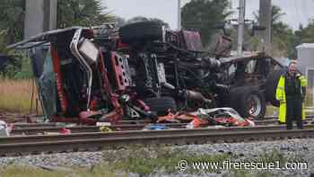 3 Fla. firefighters among 15 injured when ladder truck is struck by train