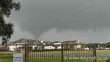 Warning for Southern states as tornados touch down with 24million under threat and hundreds of flights canceled