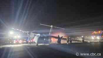 Part of plane catches fire on Halifax runway after rough landing, temporarily closing airport