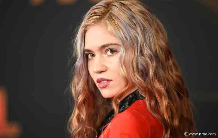 Grimes is “finally getting into Christianity” to “quit vaping”