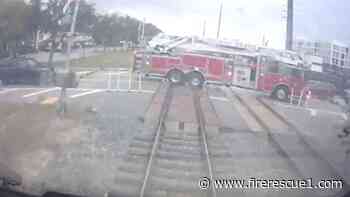 Video: Fla. fire truck passes crossing barrier before collision with train