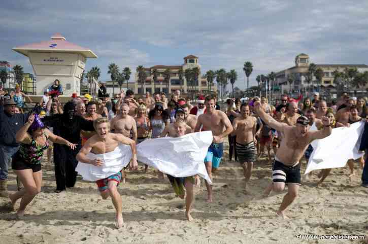 Surf City Splash will celebrate 25 years in Huntington Beach of jumping in the chilly water