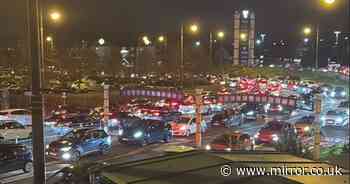 'Children cry' and drivers fight outside Trafford Centre as shoppers stuck for FIVE HOURS