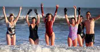 Tynemouth New Year's Day dip in photos as sunny start can't heat chilly North Sea