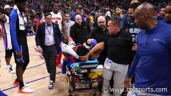 Pistons guard Jaden Ivey taken off court on stretcher with apparent serious leg injury