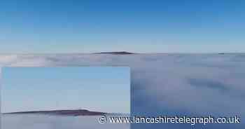 WATCH: Stunning footage shows Winter Hill above the clouds on foggy day