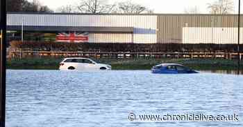 Pictures of flooding at Killingworth Way roundabout as A189 closed due to burst water main