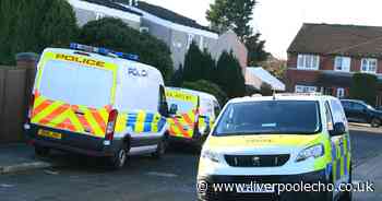 Police remain at scene of murder investigation as woman appears in court