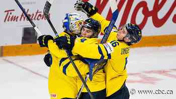 Swedes hang on for win over resilient Latvians, advance to world junior semifinals