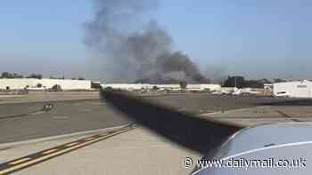 Eleven injured after small plane crashes into Southern California warehouse