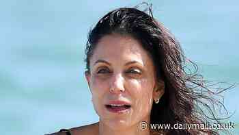 Bethenny Frankel, 54, shows off trim figure as she frolics on the beach with buff boyfriend Tom Villante in Miami