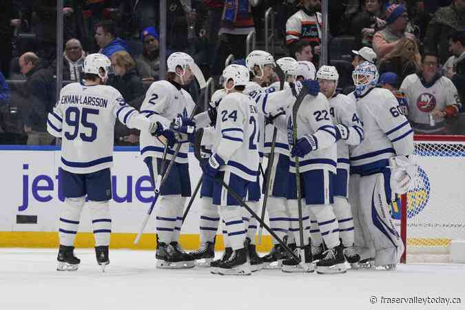 McMann, Woll lead Maple Leafs to 2-1 win over Islanders