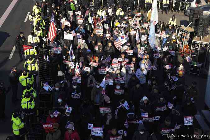 South Korea’s impeached president defies warrant in hourslong standoff