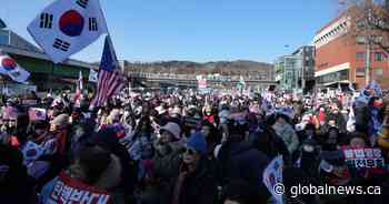 South Korea’s impeached president defies arrest warrant after standoff