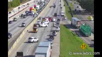 Eastbound I-10 blocked at College Drive due to vehicle fire; backup reaching Mississippi River bridge