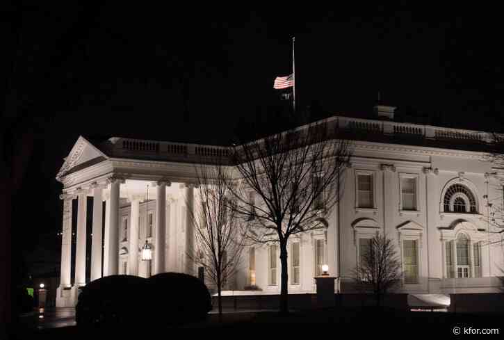 Why are US flags being flown at half-staff on Inauguration Day?