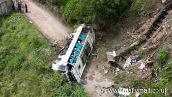 Horror as at least 12 are killed and 30 injured after bus packed with tourists plunged down 160ft gorge in Colombia