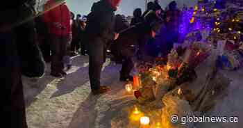 Calgarians gather for vigil, honouring slain woman and her father