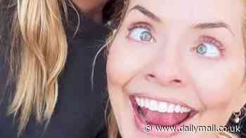 Holly Willoughby and close pal Abbey Clancy pose for a silly selfie as they ring in the New Year together