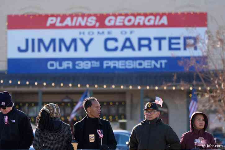 Jimmy Carter's flag-draped casket is on its way to Atlanta as 39th president's state funeral begins